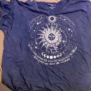 Dark bluish grey. Size medium. Brand is caution to the wind.